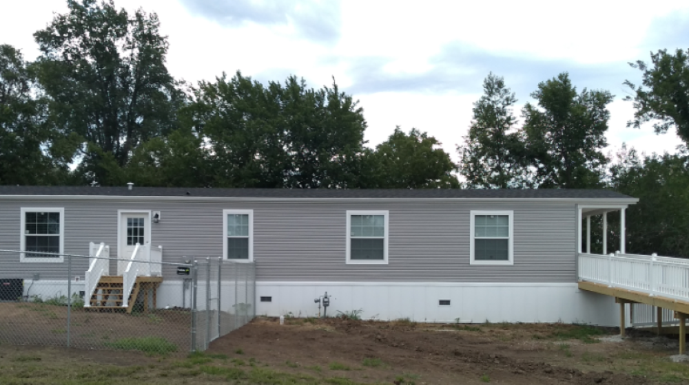 A new manufactured home with a long ramp in Iowa